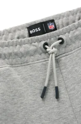 BOSS x NFL signature-tape tracksuit bottoms with special branding