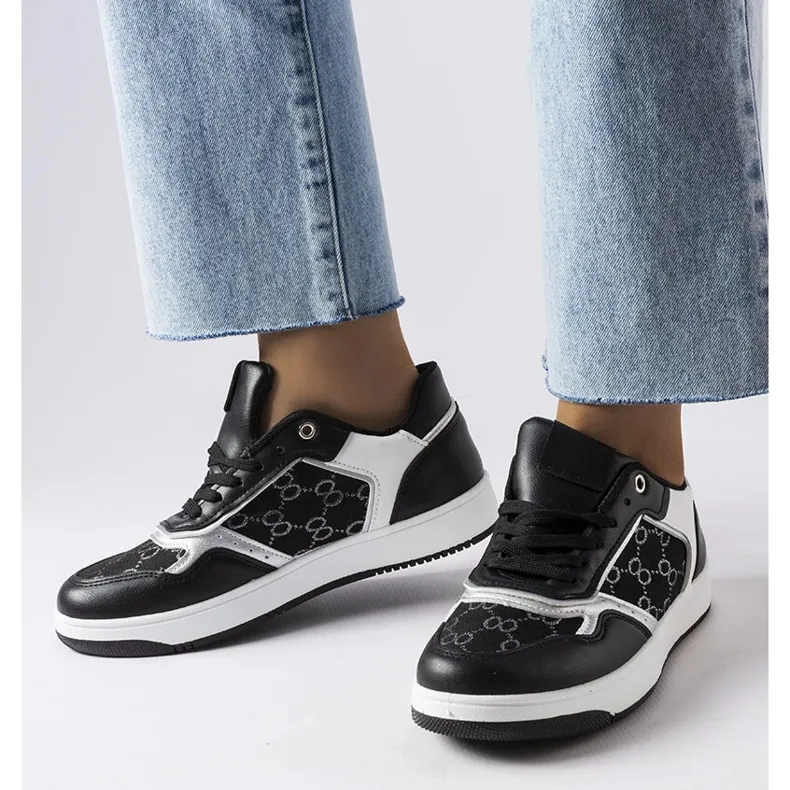 Inna Black sneakers decorated with the Isidor monogram