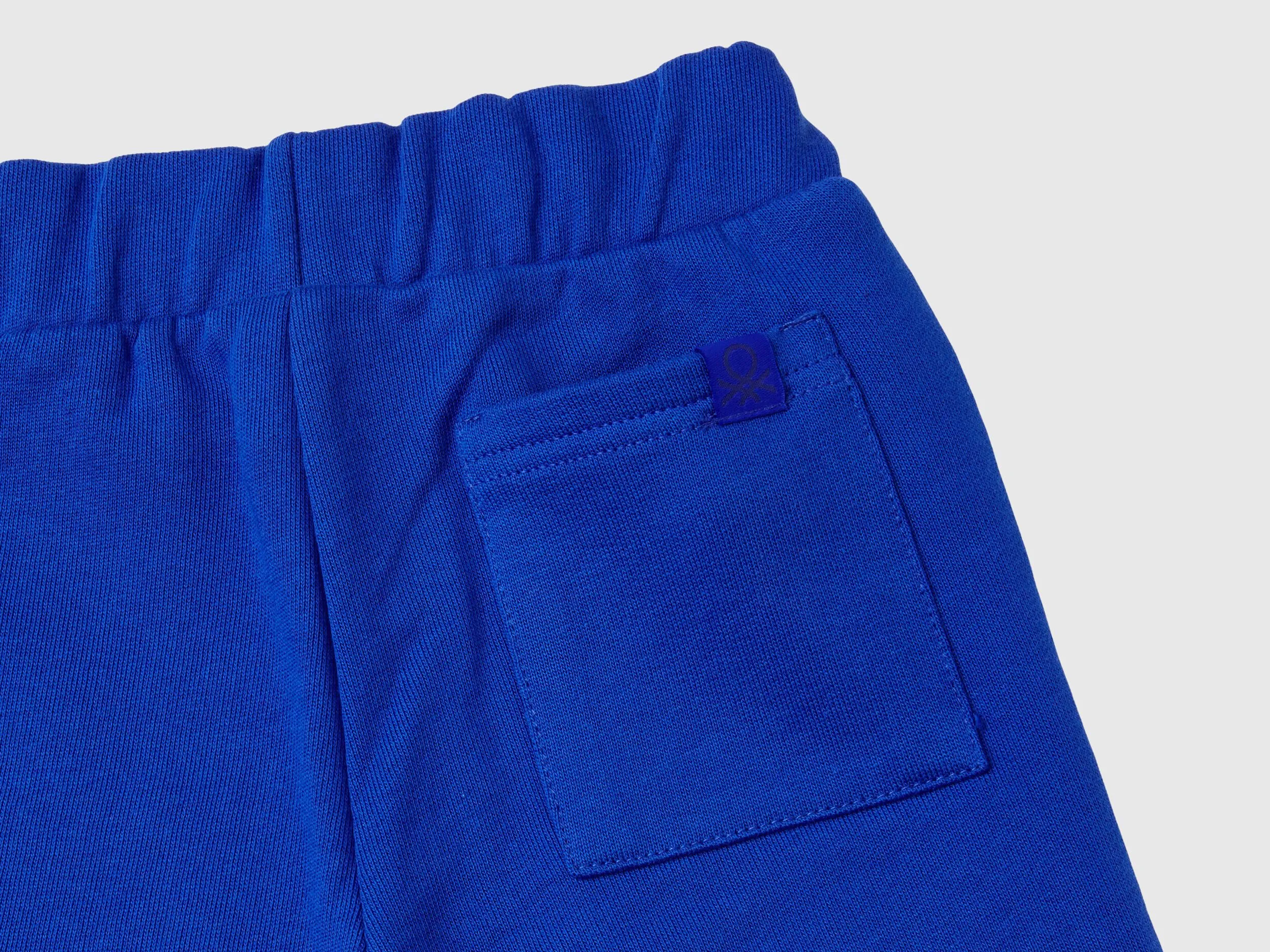 Sweat tracksuit with logo - Bright Blue | Benetton